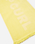 The Rip Curl Premium Surf Towel in Bright Yellow
