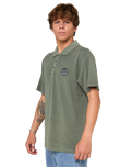 The Rip Curl Mens Wettie Polo Shirt in Cactus Green