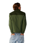 The Rip Curl Mens Classic Surf Cord Puffer Jacket in Dark Olive