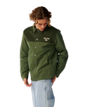 The Rip Curl Mens Classic Surf Cord Puffer Jacket in Dark Olive