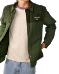 The Rip Curl Mens Classic Surf Cord Puffer Jacket in Dark Olive