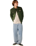 The Rip Curl Mens Classic Surf Cord Puffer Jacket in Dark Olive