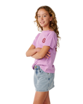 The Rip Curl Girls Girls Surf Puff T-Shirt in Bright Lilac