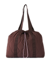 The Rip Curl Bilbao Cinch Tote Bag in Dark Plum