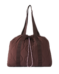 The Rip Curl Bilbao Cinch Tote Bag in Dark Plum