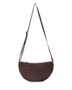 The Rip Curl Womens Bilbao Crossbody Bag in Dark Plum