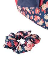 The Rip Curl Double Dome 24L + SCR Mixed Backpack in Navy Pink