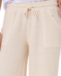 The Rip Curl Womens Cala Nights Textured Trousers in Natural