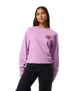 The Rip Curl Womens Surf Puff Raglan Relaxed Sweatshirt in Bright Lilac