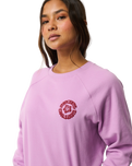 The Rip Curl Womens Surf Puff Raglan Relaxed Sweatshirt in Bright Lilac