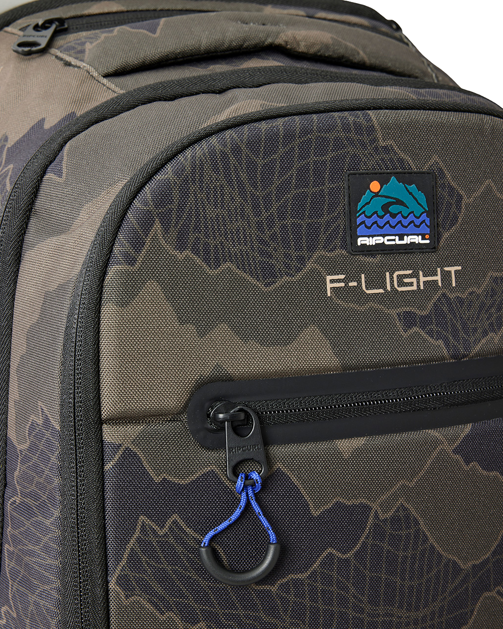 The Rip Curl F-Light Posse Search Camo 35L Backpack in Black & Olive