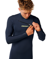 The Rip Curl Mens Dawn Patrol Pro 4/3mm Chest Zip Wetsuit in Navy