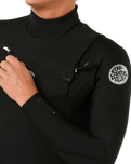 The Rip Curl Mens Dawn Patrol Pro 5/3mm Chest Zip Wetsuit in Black