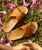 Kīpe‘a ‘Olu Leather Sliders in Sahara