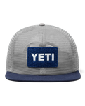 The Yeti Mens Velcro Badge Flat Brim Mesh Cap in Grey & Navy