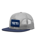 The Yeti Mens Velcro Badge Flat Brim Mesh Cap in Grey & Navy