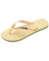 The Havaianas Mens Brazil Logo Flip Flops in Buttercream