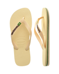 The Havaianas Mens Brazil Logo Flip Flops in Buttercream