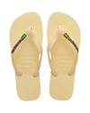 The Havaianas Mens Brazil Logo Flip Flops in Buttercream