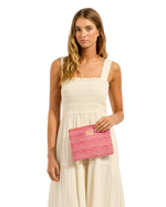 The Seafolly Viva Vacation Bikini Bag Bag in Cosmo Red