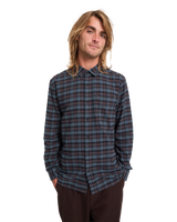 The Volcom Mens Caden Plaid Shirt in Raisin