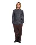 The Volcom Mens Caden Plaid Shirt in Raisin