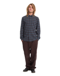 The Volcom Mens Caden Plaid Shirt in Raisin