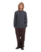 The Volcom Mens Caden Plaid Shirt in Raisin