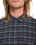 The Volcom Mens Caden Plaid Shirt in Raisin