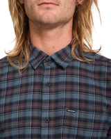 The Volcom Mens Caden Plaid Shirt in Raisin