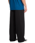 The Volcom Mens Baggos Pleat Trousers in Black