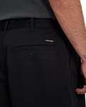 The Volcom Mens Holter Pleat Trousers in Black