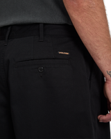The Volcom Mens Holter Pleat Trousers in Black