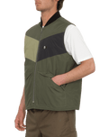 The Volcom Mens Prysmer Gilet in Squadron Green