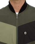 The Volcom Mens Prysmer Gilet in Squadron Green