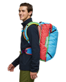 The Cotopaxi Allpa 42L Travel Backpack in Del Día