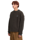 The Volcom Mens Too Kool Sweatshirt in Rinsed Black