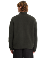 The Volcom Mens Storm Stone Fleece Jacket in Rinsed Black