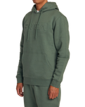 The RVCA Mens Big RVCA Embossed Hoodie in Jade