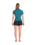 The C-Skins Womens NuWave Rash X Rash Vest in Emerald & Light Blue