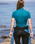 The C-Skins Womens NuWave Rash X Rash Vest in Emerald & Light Blue