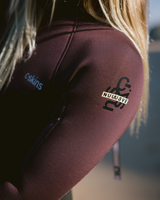 The C-Skins Womens NuWave Surflite 5/4mm Back Zip Wetsuit in Black, Rust & Yellow