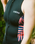 The C-Skins Womens NuWave Solace Lite 2/2mm Front Zip Long Jane Wetsuit in Black & Tropical