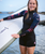 The C-Skins Womens NuWave Solace Lite 2/2mm Back Zip Spring Wetsuit in Black & Tropical