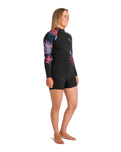 The C-Skins Womens NuWave Solace Lite 2/2mm Back Zip Spring Wetsuit in Black & Tropical