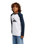 The Quiksilver Boys Boys Comp Raglan Long Sleeve T-Shirt in Dark Navy