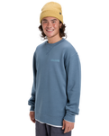 The Quiksilver Mens Salt Water Graphic Sweatshirt in China Blue