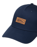 The Quiksilver Mens Decades Cotton Patch Trucker Cap in Dark Denim