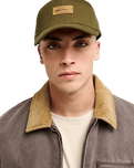 The Quiksilver Mens Decades Cotton Patch Trucker Cap in Grape Leaf