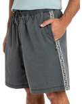 The Quiksilver Mens Taxer Global Heat Walkshorts in Dark Shadow